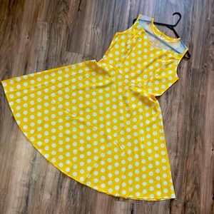 Women’s a line, yellow and white polkadot dress.